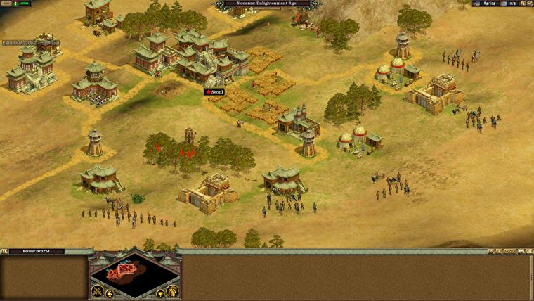 Una captura de pantalla de una aldea en Rise Of Nations.