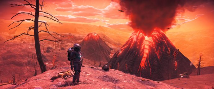 El jugador posa frente a un volcán en No Man's Sky.